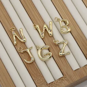 Gold brass letter alphabet charms pendants for DIY necklace jewelry making accessories.