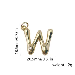 Gold plated brass letter W pendant detail closeup, elegant diy necklace jewelry accessory.