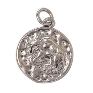 Taurus zodiac sign metal pendant detail, vintage silver tone round charm for DIY jewelry making.