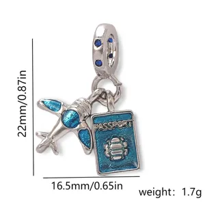 Detailed shot of airplane and passport metal charm with blue enamel for DIY jewelry making.