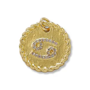 Detailed view of a gold-plated Cancer zodiac sign pendant with sparkling micro-inlaid cubic zirconia.