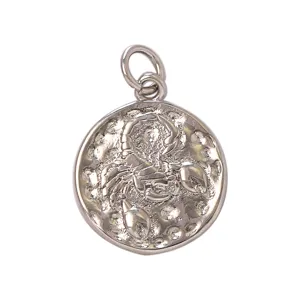 Detailed close-up of a vintage round silver zodiac Scorpio pendant charm for DIY necklaces.