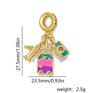 Gold-plated enamel travel charm pendant with airplane suitcase and camera design for DIY jewelry.