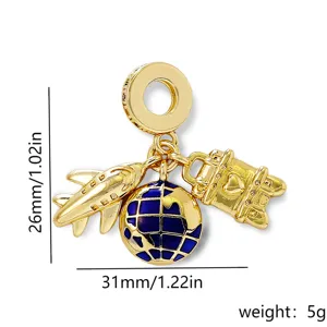 Gold plated travel charm pendant with airplane earth and suitcase, 26x31mm DIY jewelry accessory.