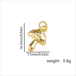 Vue détaillée du pendentif champignon en cristal doré, taille 16,3x11mm et poids 0,8g.