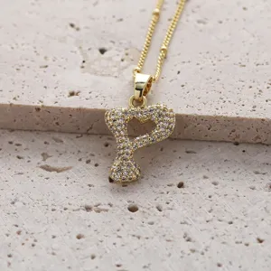 Collier pendentif lettre Y en zircone cubique micro-pavée en cuivre plaqué or pour femme.