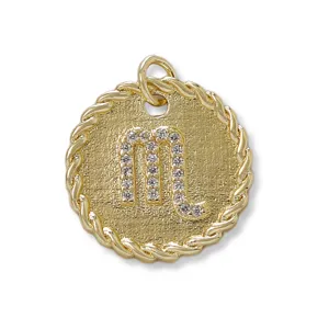 Detail shot of gold plated round DIY pendant featuring sparkling pavé zirconia letter design.
