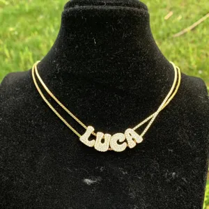 Collier double couche pendentif lettre LUCA strass doré bijou tendance accessoire
