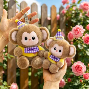 Cute plush monkey keychain stuffed animal pendant with cute hat and bib for bags keys decor.