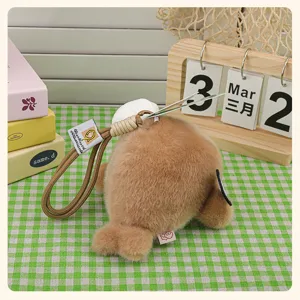 Cute plush otter keychain with chef hat, soft stuffed animal bag charm and cute doll gift.
