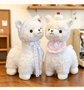 Cute fluffy alpaca plush toy with sweet cherry and lace bib details, soft doll gift.