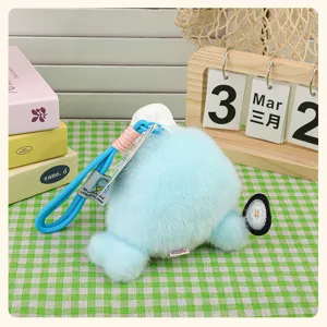 Plush sea otter pendant detail view, cute blue bag charm and fluffy toy accessory setup.