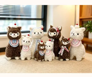 Detailed view of cute fluffy alpaca sheep plush toy set with sweet cherry and lace bibs.