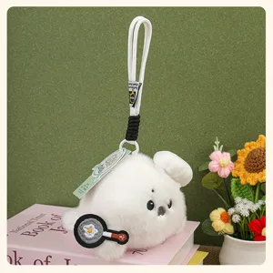Cute white sea otter plush pendant with chef hat and pan patch, fluffy bag charm ornament doll.