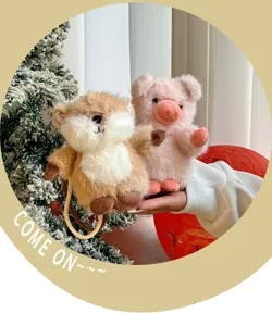 Close-up detail view of cute plush animal keychain pendants, soft healing style hanging.