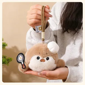 Cute plush sea otter keychain with chef hat and frying pan bag charm fluffy doll gift