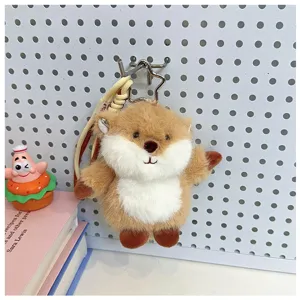 Simpatico portachiavi in peluche di cartone animato, ciondolo morbido per zaino e chiavi.