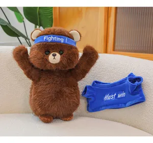 Cute brown plush bear toy with blue headband and removable shirt, soft stuffed animal gift.