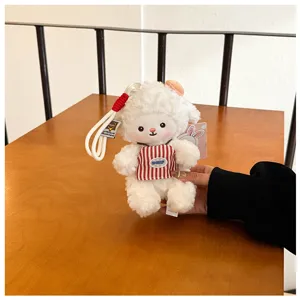 Cute fluffy sheep plush toy keychain, soft stuffed animal bag pendant and adorable accessory.