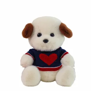 Cute plush dog toy wearing a blue sweater with red heart pattern, soft stuffed animal doll for kids.