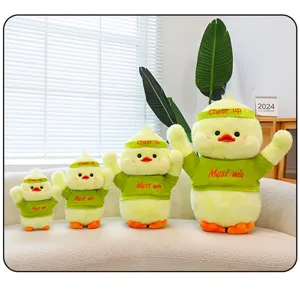 Cute plush yellow duck toy set with green clothes and headband for kids gifts.