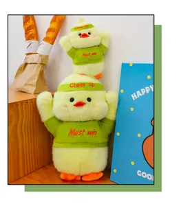 Cute yellow plush duck doll set with removable green clothes and headband, soft gift for kids.