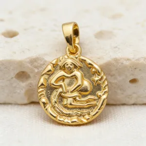 Detailed shot of the retro gold zodiac coin pendant featuring an intricate embossed design.