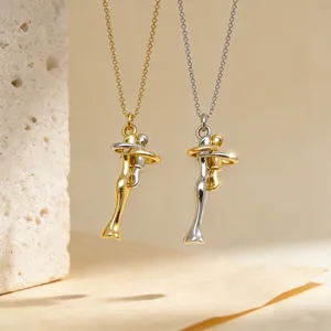 Detailed shot of trendy two-tone hugging couple necklace, minimalist design, elegant clavicle chain.