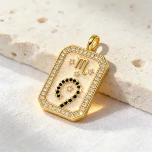 Scorpio zodiac tarot gold pendant detail shot, sparkling zircon stones and shiny metal finish.
