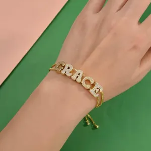 Gold-plated bubble letter bracelet with sparkling cubic zirconia stones for women daily wear.