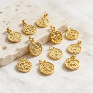 Retro gold-plated zodiac sign pendants, vintage embossed coin charms for DIY jewelry making.