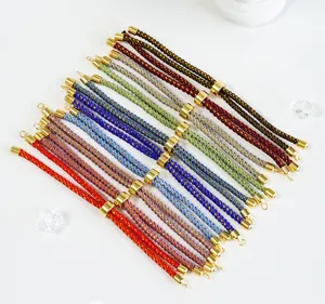Adjustable braided Milan cord bracelet with 18k gold plated metal tubes for DIY jewelry.