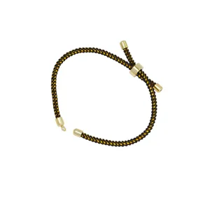 Black and gold braided Milan cord adjustable pull bracelet detail view, elegant DIY design.
