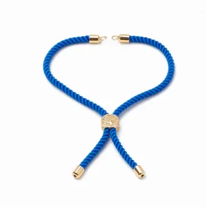 Cordon de bracelet tressé bleu réglable avec embouts métalliques dorés et perle arbre de vie.