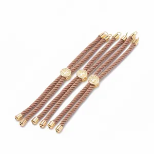 Image principale d'accessoires de bracelet en cordon tordu rose-brun avec des perles en métal.
