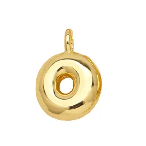 Gold plated letter O initial pendant detail view, stylish minimalist fashion jewelry charm accessory.