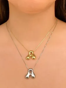 Stunning gold and silver layered puffy letter pendant necklace for women, stylish jewelry.