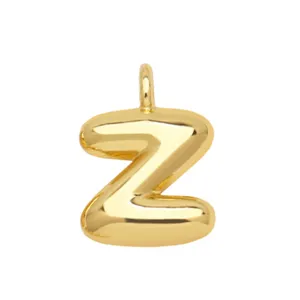 Gold-plated balloon letter Z pendant detail shot, cute metallic initial charm for necklace.
