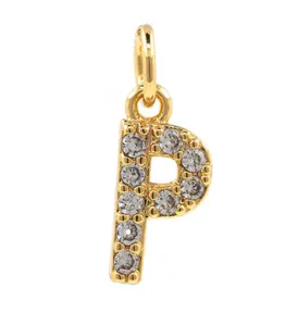 Gold plated copper micro paved cubic zirconia letter P pendant jewelry accessory detail.