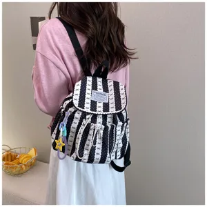 Chic striped canvas backpack for women and students, casual daily school bookbag.