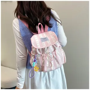 Pink striped canvas backpack for women, cute school bag for daily commute, casual daypack.