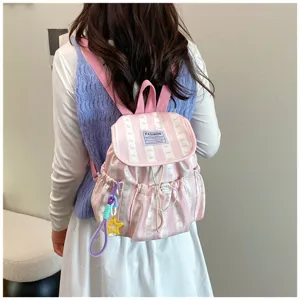 Pink striped mini backpack for women, cute sweet style school bag with drawstring closure.