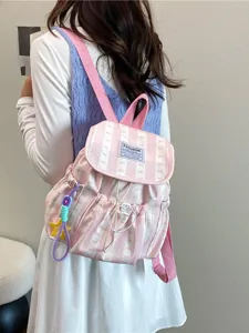 Pink striped backpack for women, cute casual school bag for daily commuting and travel.