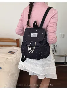 Zaino minimalista nero a pois da donna, elegante zainetto casual vintage per viaggi.