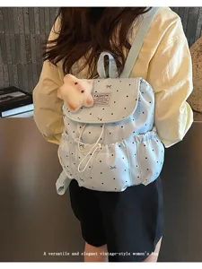 Zaino casual a pois con fiocco e coulisse per donne, borsa vintage graziosa per viaggi.