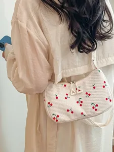 Chic corduroy shoulder bag with cute red cherry embroidery, versatile trendy daily casual handbag for women.