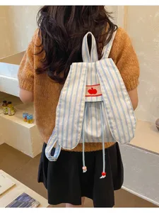 Cute striped rabbit ear backpack detail view, casual soft girl canvas bag showing fabric texture.
