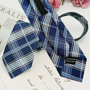Close-up view of the blue plaid zipper necktie showcasing fabric texture and detailed construction.