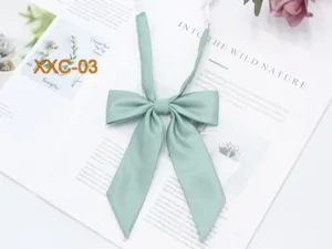 Élégant nœud papillon sergé vert sauge pour femmes accessoire uniforme JK détail