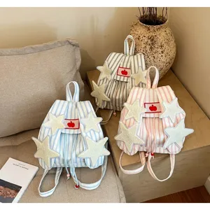 Detailed view of casual striped backpacks featuring cute star patches and lovely design.